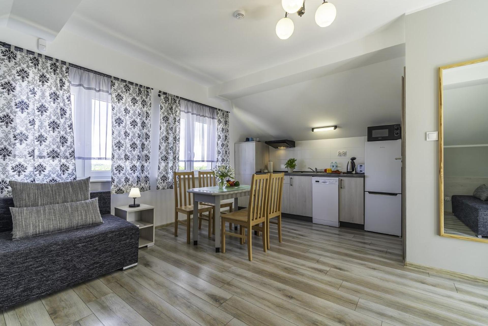 Frajda Domki - Apartamenty 6-Osobowe - Salon I Dwie Sypialnie Oraz Studia 4-Osobowe - Pokoj Z Aneksem Kuchennym Rewal Eksteriør bilde